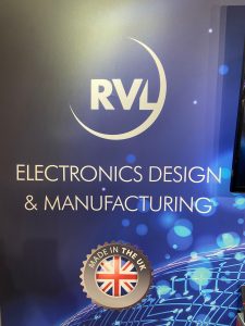 Electronics Design and Manufacturing. Company logo for RLV. Made in the UK logo for RVL. Blue background image